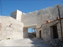 Muralla en la puerta de Las Cuevas después de su restauración.