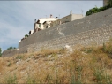 Muralla y contramuralla del segundo recinto junto a la calle de las Cuevas. Estado después de su restauración.